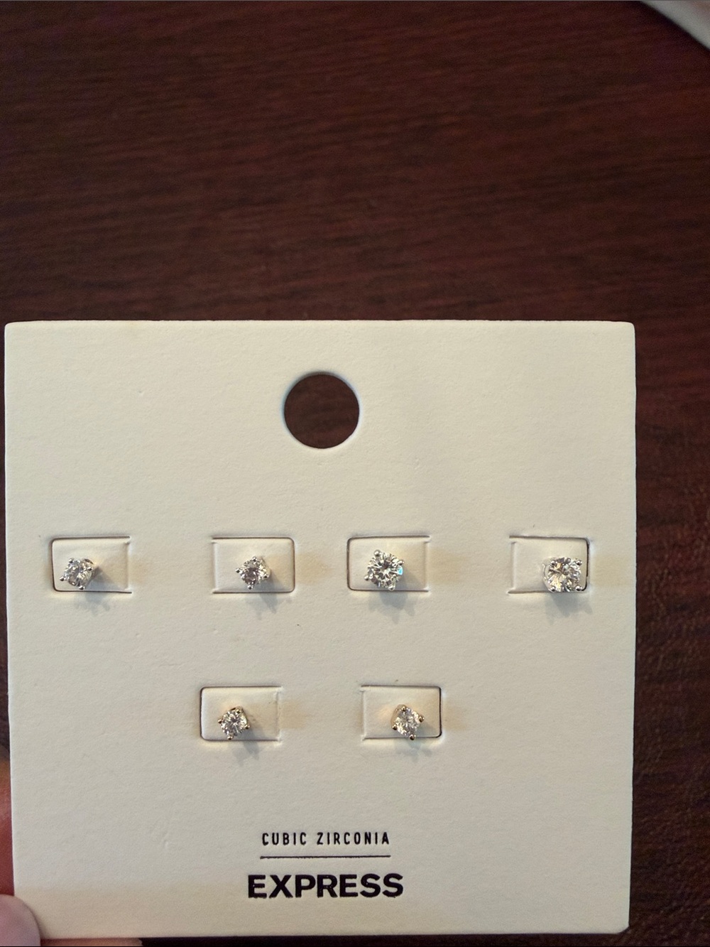 Express Clear Cubic Zirconia Stud Earring two silver based and one gold.